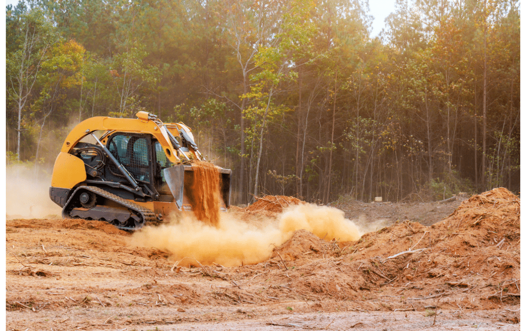 Préparation de terrain avec machinerie pour construction de maison sur un terrain au Québec